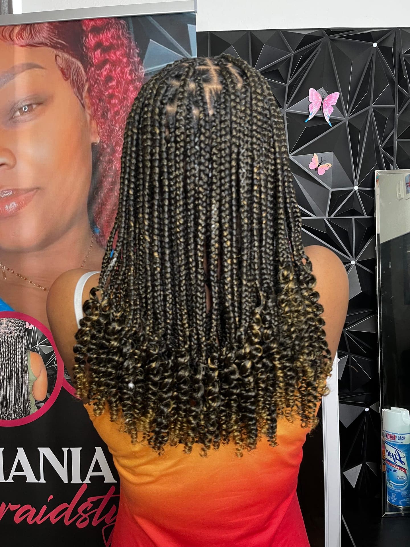 Box braids with blonde and caramel highlights